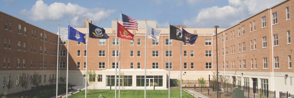 Exterior of Piquestte Square with military flags flying