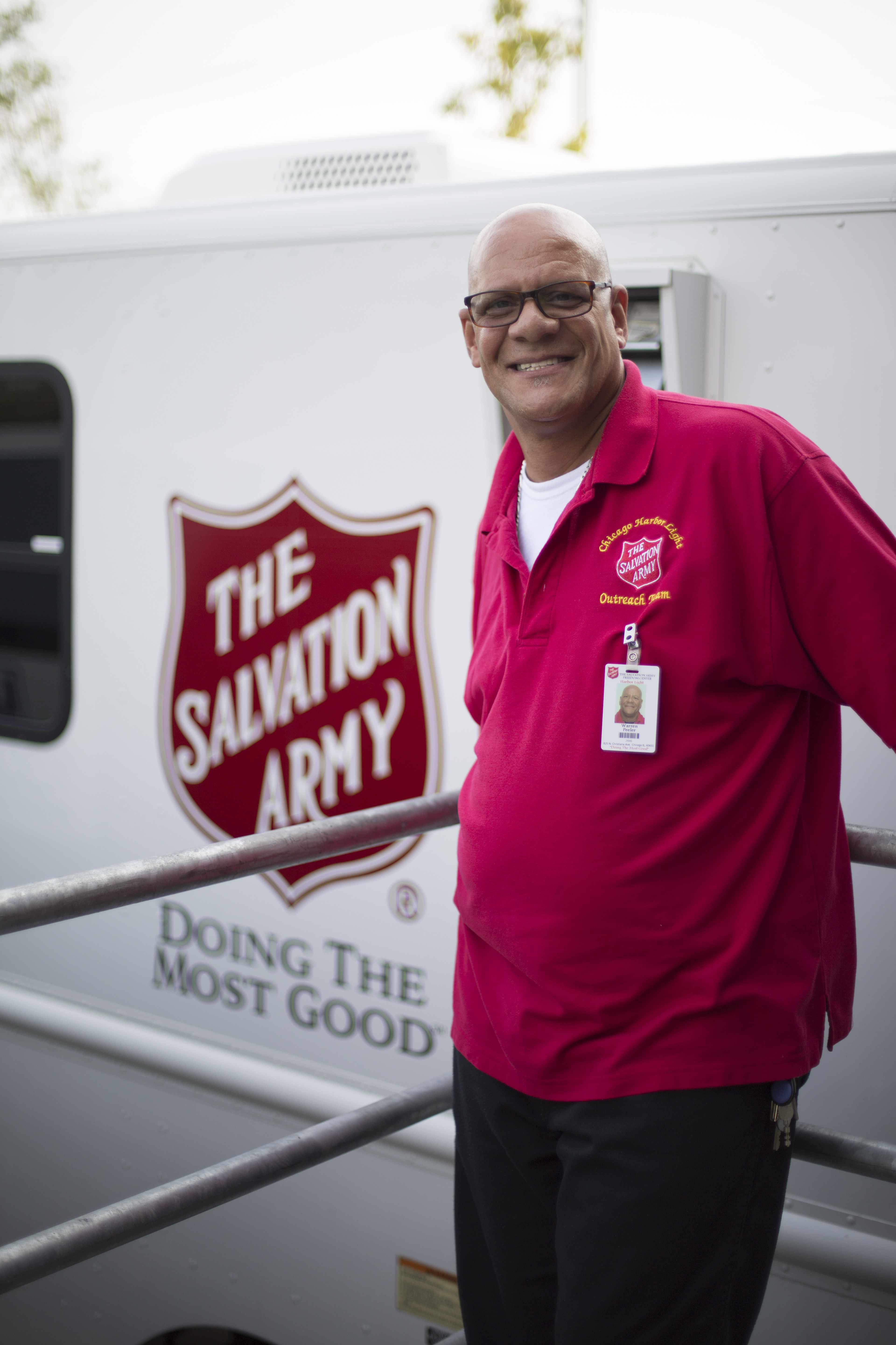 Man in front of Salvation Army Mobile Assistance Truck