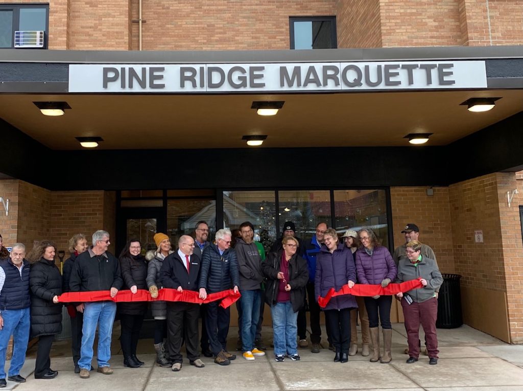 Partners at ribbon cutting for Pine Ridge Marquette building