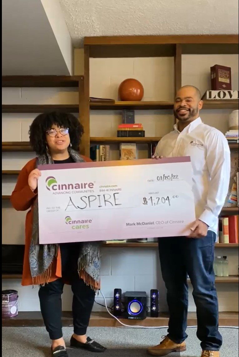 Donation check presentation Aspire