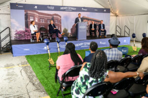 Crowd watching the speakers at the Henry St Groundbreaking 