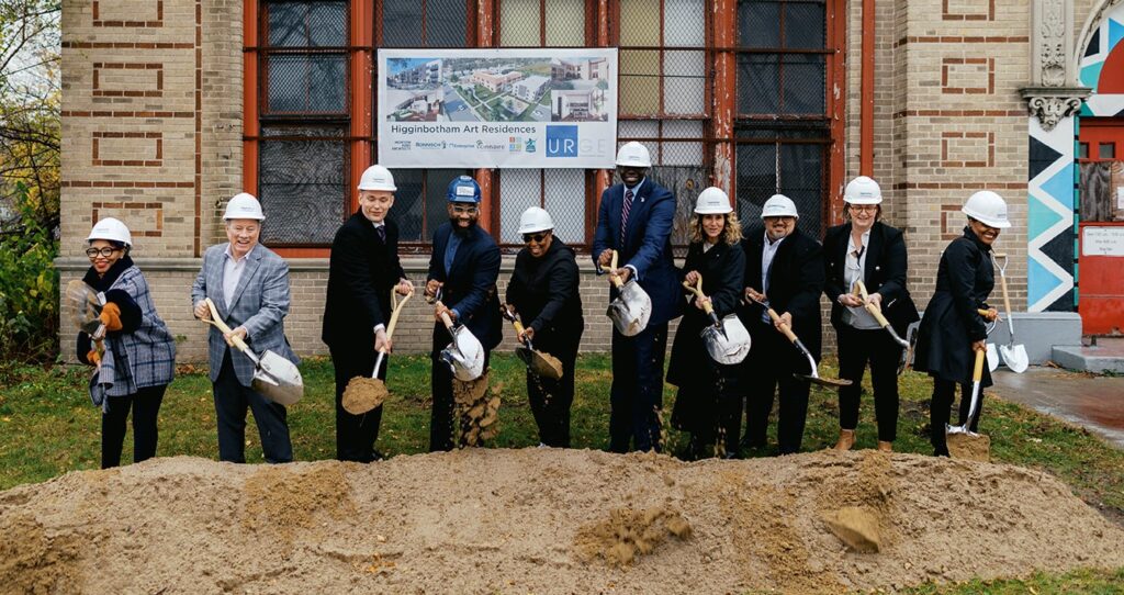 Dignitaries shovel dirt at Higginbothum Residences Groundbreaking ceremony